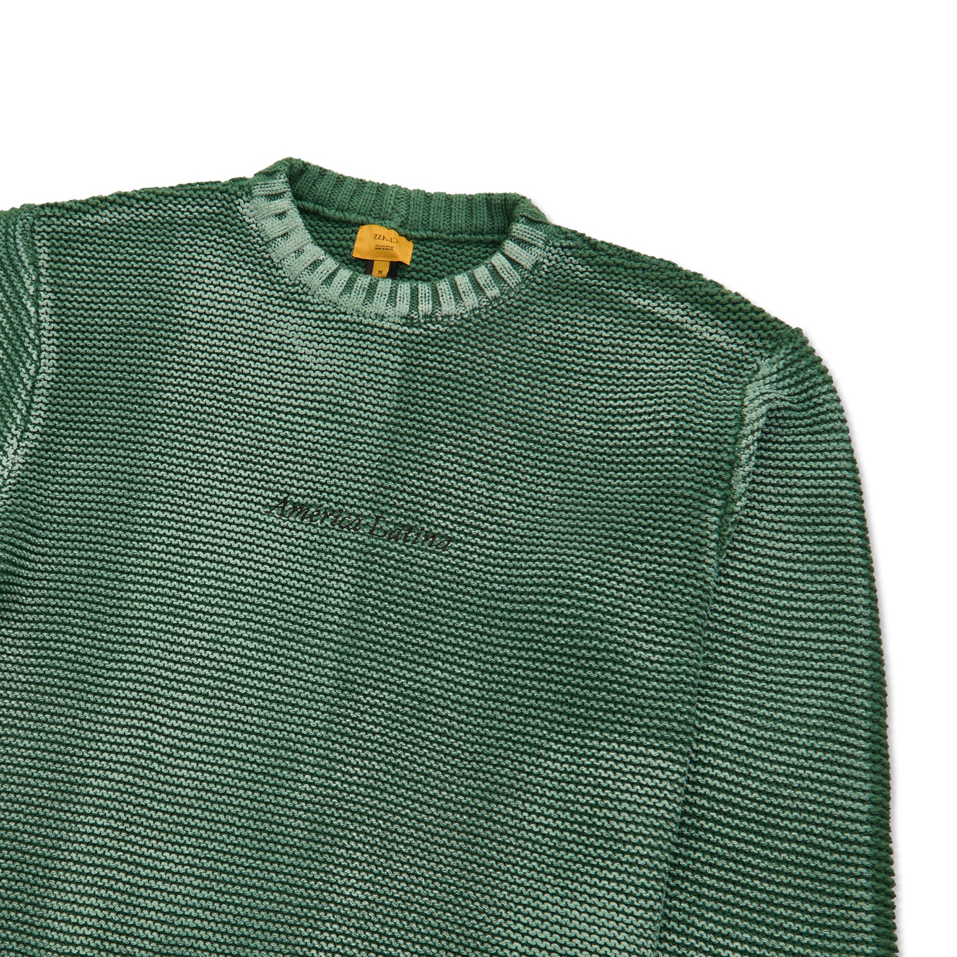 Suéter jacquard verde com gola careca e textura em tricô