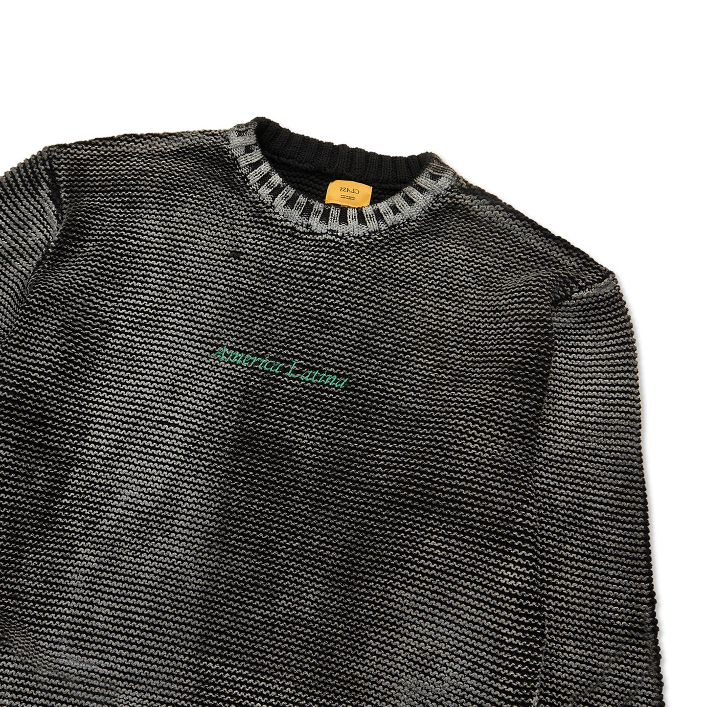 Suéter de tricô jacquard preto com gola canelada e faixa verde no peito
