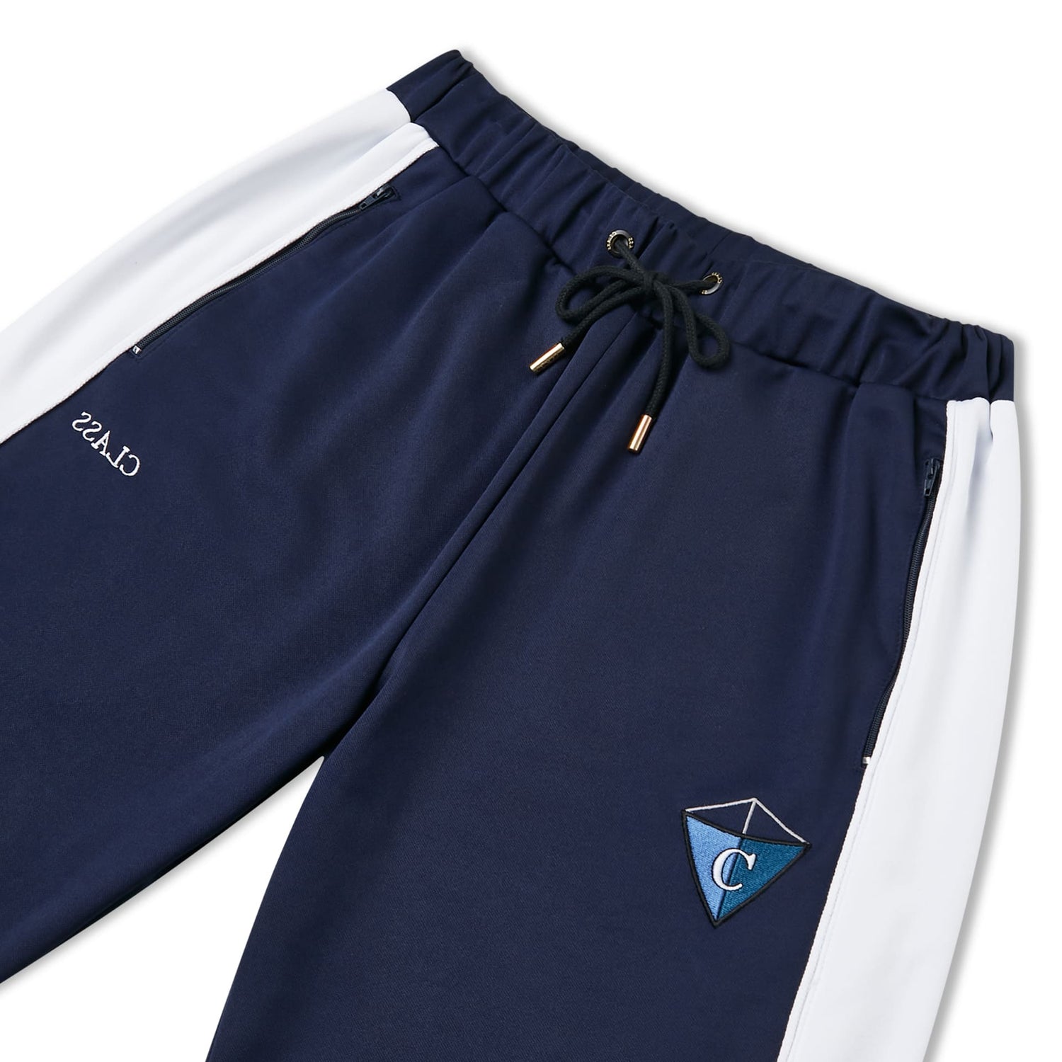 Calça track azul-marinho com cós elástico, cordão e etiqueta triangular no lado