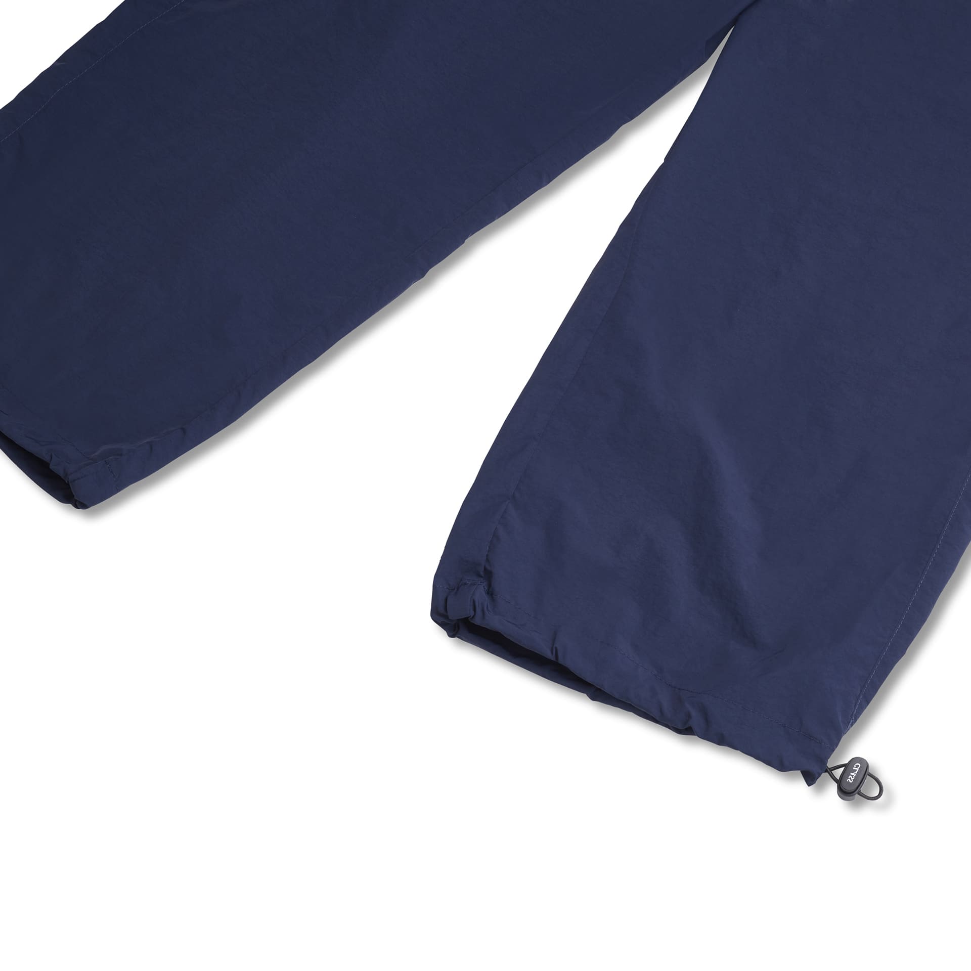 Calça arquitetônica Pipa azul-marinho com barra ajustável por cordão e fecho